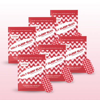 Six packages of 'Ugly Sleep Club' mouth tape on a pink background