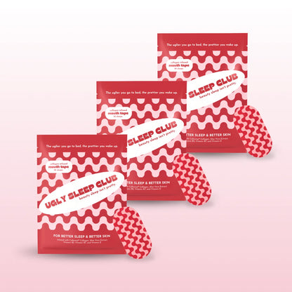 Three packages of red and pink mouth tape on a light pink background
