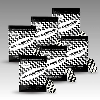 Six packages of black and white Ugly Sleep Club mouth tape on a gray background